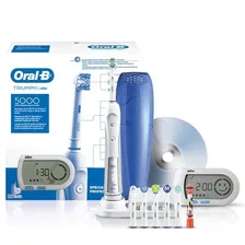 Электрическая зубная щетка Oral-b Triumph + 7 насадок